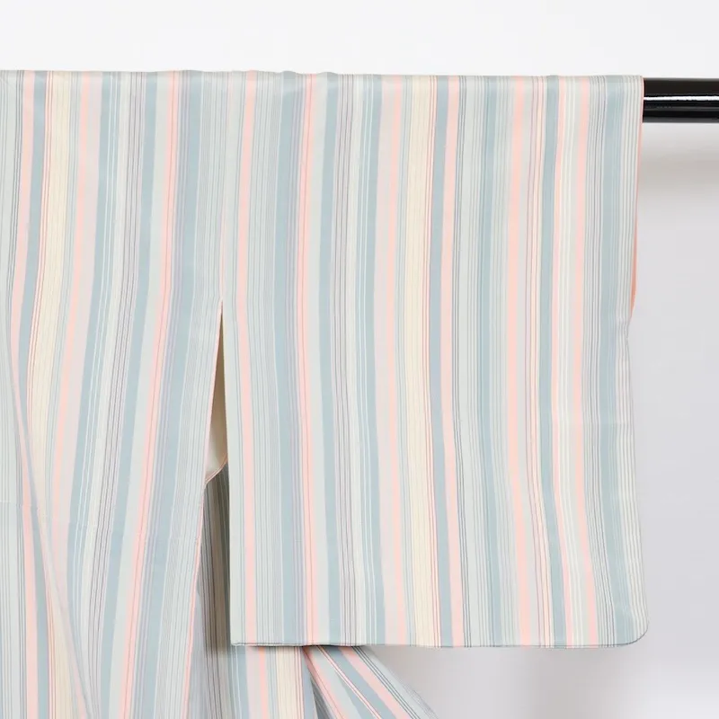Japan used kimono fabric, shades of gray, orange, beige, indigo, and irregular stripes. T53