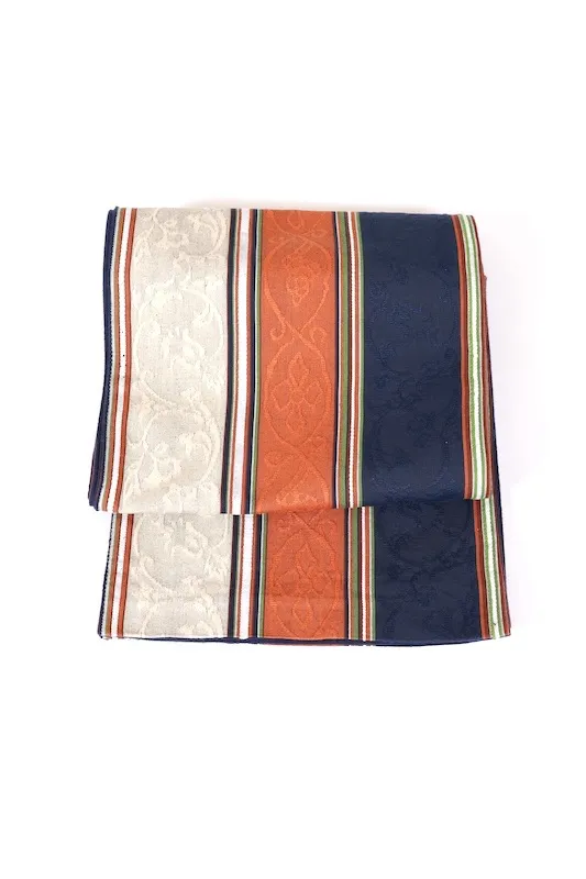 Nagoya obi used(sash), Tsumugi silk, off-white, indigo, shades of brown, green, white, floral pattern, stripes, L3