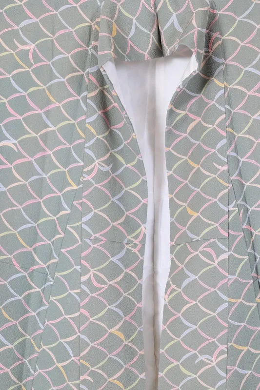 Japan used kimono fabric in green, purple, mustard yellow, gray, and coral yellow with an abstract pattern. B1468