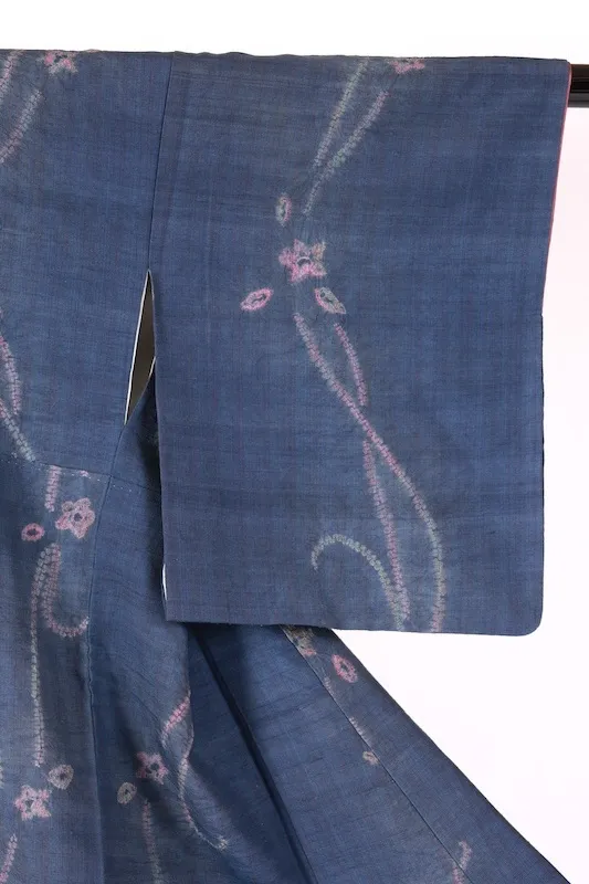 Tsumugi (Japan kimono) indigo and cherry-blossom pink; *nuitori-shibori* (stitched resist-dyeing) and *boshi-shibori* (capped resist-dyeing); abstract pattern; K327.