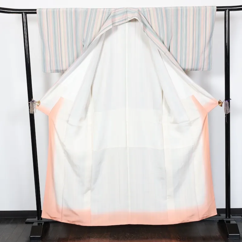 Japan used kimono fabric, shades of gray, orange, beige, indigo, and irregular stripes. T53