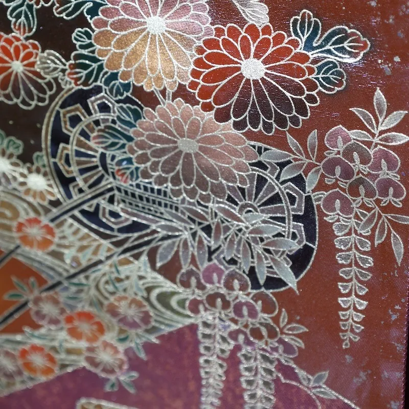 Fukuro obi　used (formal sash), lacquer and gold leaf, plum blossoms, chrysanthemums, cherry blossoms, seigaiha (wave pattern), flower cart, rust-red, tataki (stamped) finish, taiko (drum-shaped) pattern, P